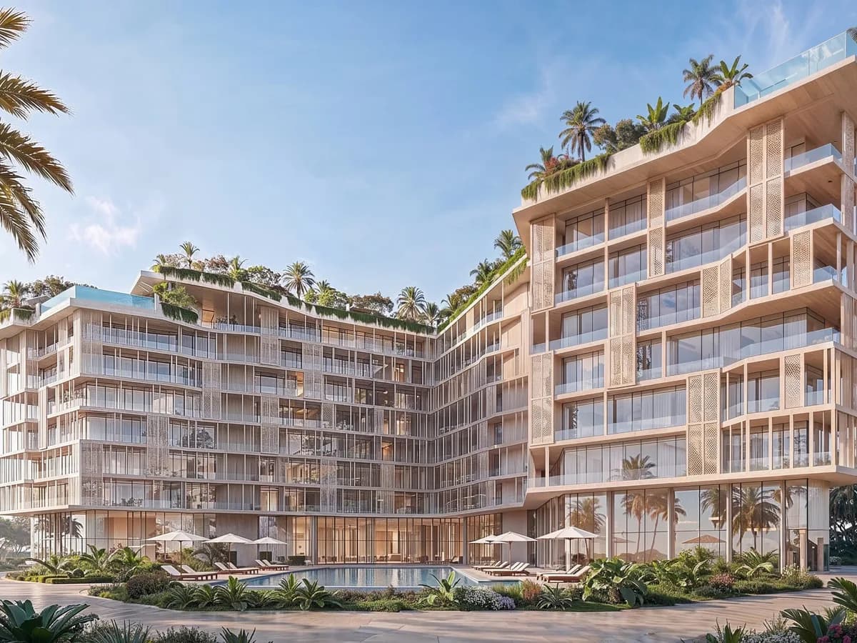 Render of the Richmond Residences building: two cream-coloured wings with lattice screens, glass balconies, rooftop gardens and pools, a palm-lined pool deck in front