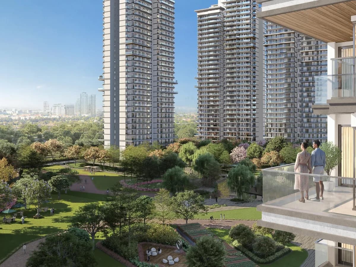 Artist's impression of Serenity Hills high-rise towers around landscaped central greens, seen from a balcony where a couple stands